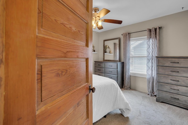 bedroom featuring ceiling fan and carpet floors