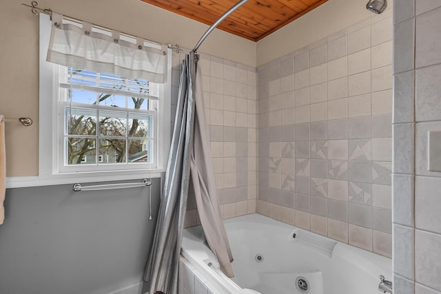 bathroom featuring wooden ceiling and a combined bath / shower with jetted tub