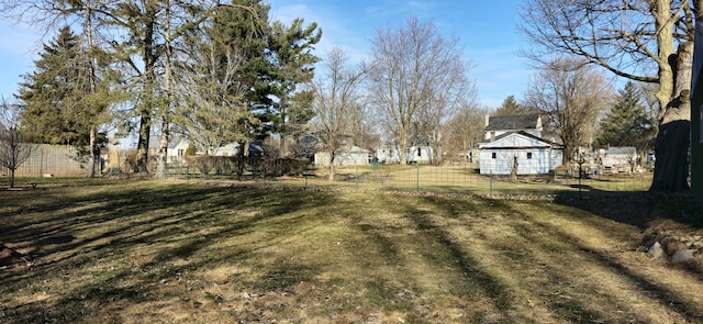 view of yard with fence