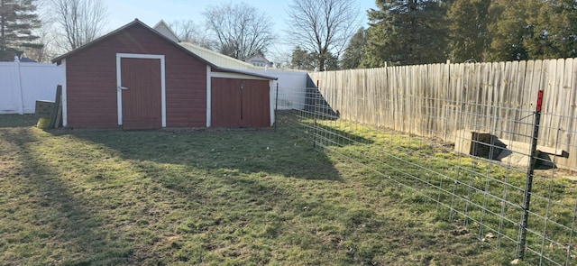 view of shed featuring a fenced backyard