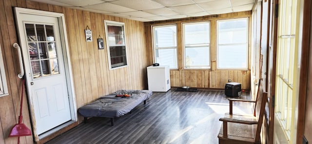 interior space featuring a drop ceiling