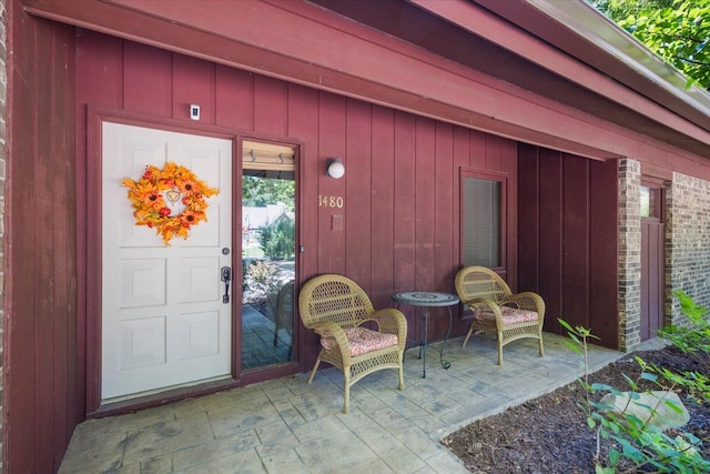 property entrance featuring a patio