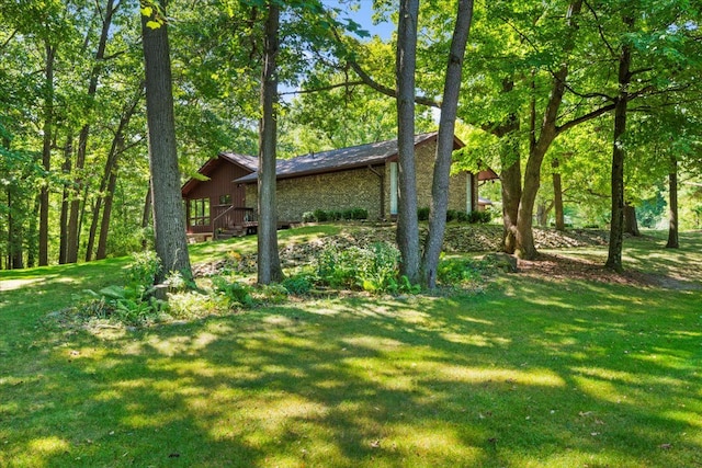 view of yard featuring a wooden deck