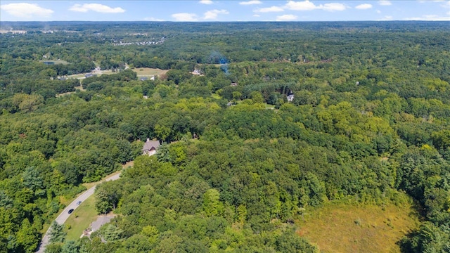 aerial view featuring a forest view