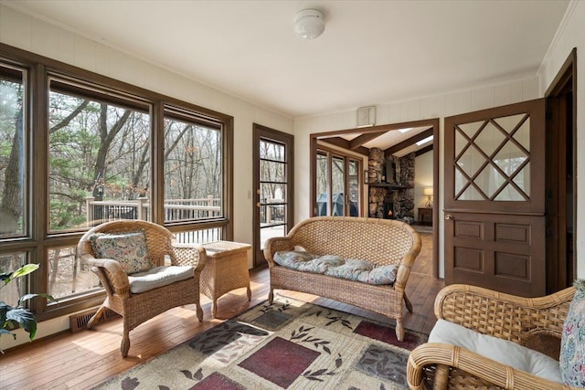 sunroom featuring a healthy amount of sunlight