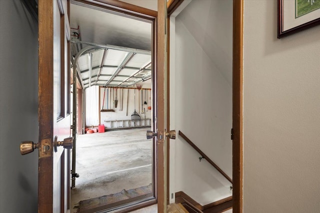 doorway to outside featuring concrete flooring