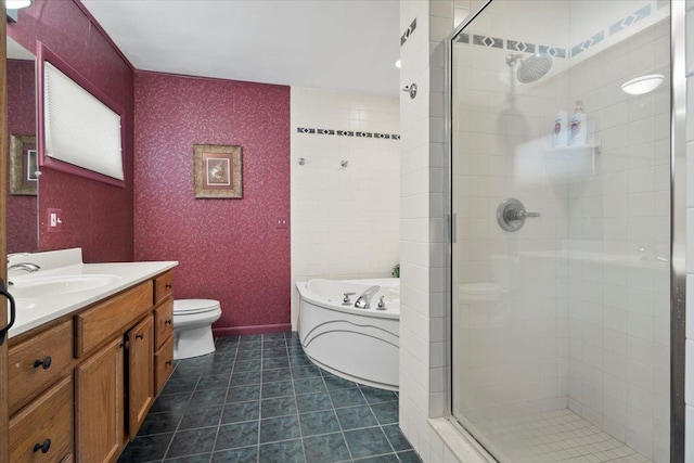 bathroom with a shower stall, wallpapered walls, toilet, a garden tub, and vanity