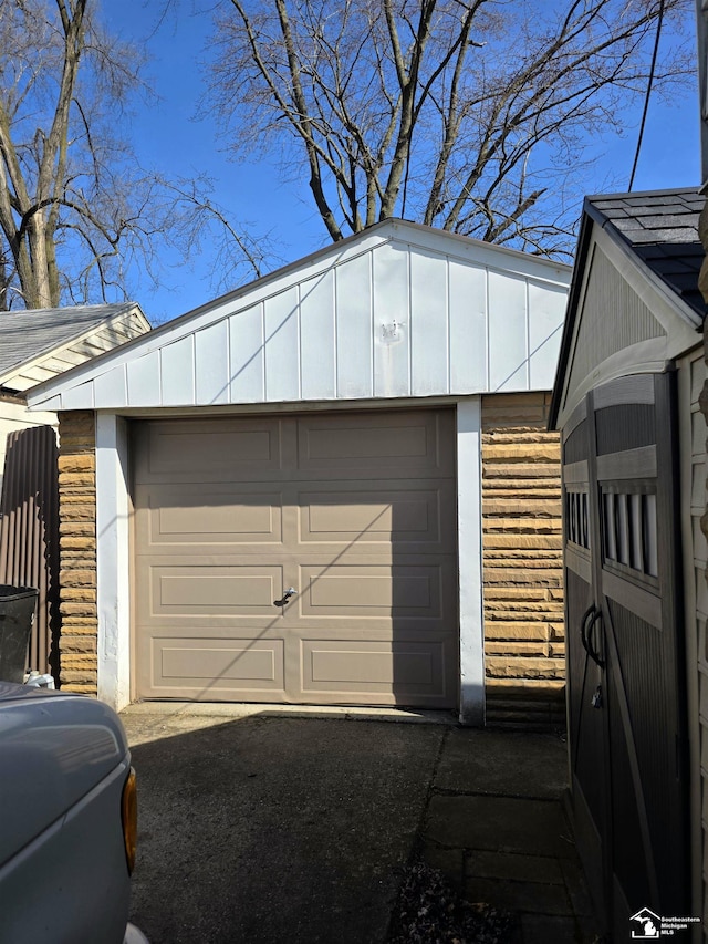 garage featuring driveway