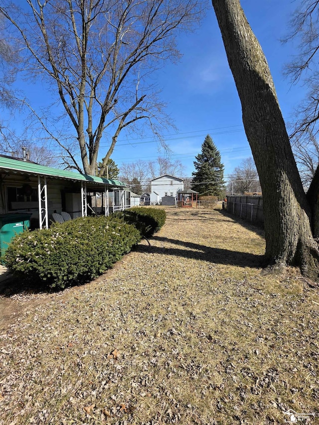 view of yard featuring fence