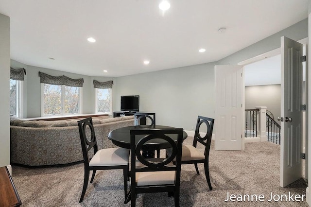 dining area featuring recessed lighting and carpet