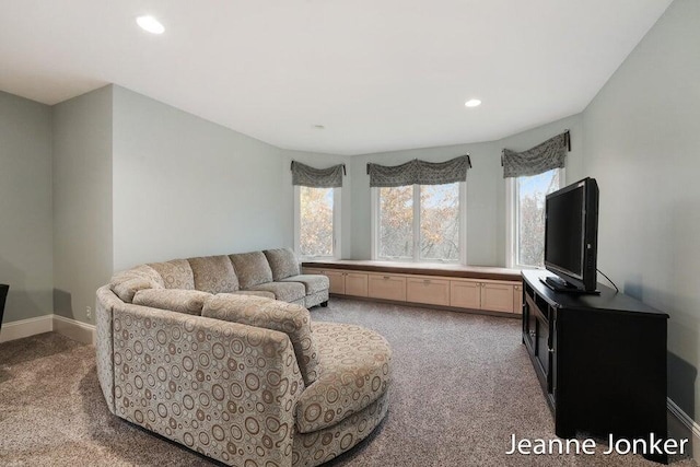 living room with carpet, recessed lighting, and baseboards