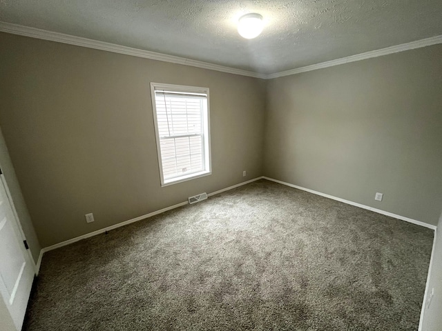 spare room featuring crown molding, carpet flooring, baseboards, and a textured ceiling