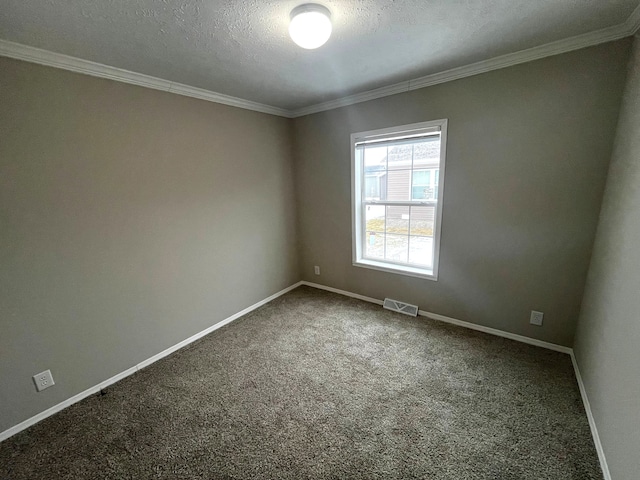 unfurnished room featuring visible vents, crown molding, baseboards, carpet floors, and a textured ceiling