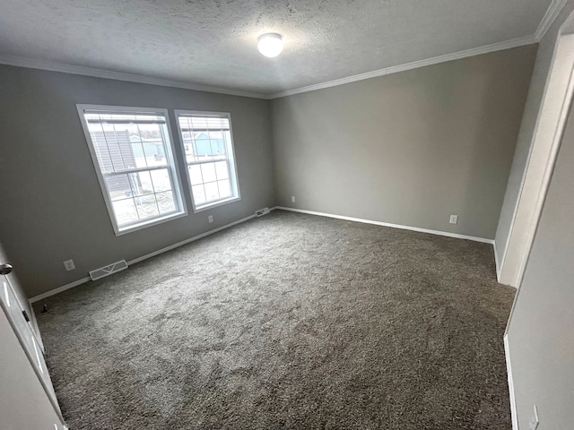 unfurnished bedroom featuring visible vents, a textured ceiling, carpet floors, crown molding, and baseboards