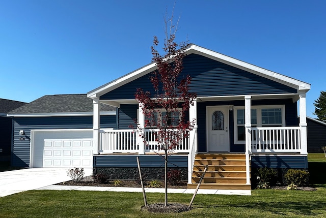 view of front of home featuring a porch, roof with shingles, concrete driveway, a front yard, and an attached garage