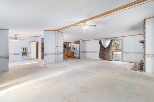 garage with ceiling fan and stainless steel refrigerator with ice dispenser