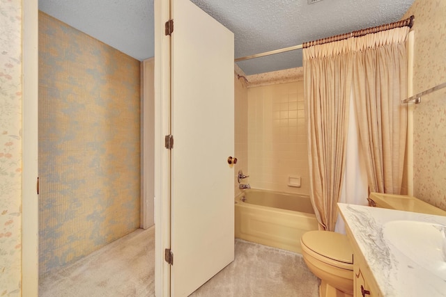 full bath featuring wallpapered walls, toilet, shower / tub combo with curtain, vanity, and a textured ceiling