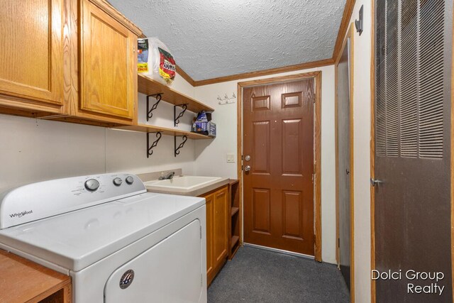 laundry room with washer / dryer, cabinet space, a heating unit, a sink, and a textured ceiling