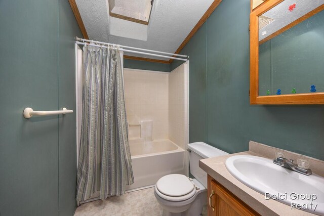 bathroom with shower / bath combination with curtain, toilet, a textured ceiling, and vanity