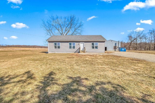 single story home with a front lawn