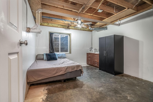 bedroom with concrete floors and ceiling fan