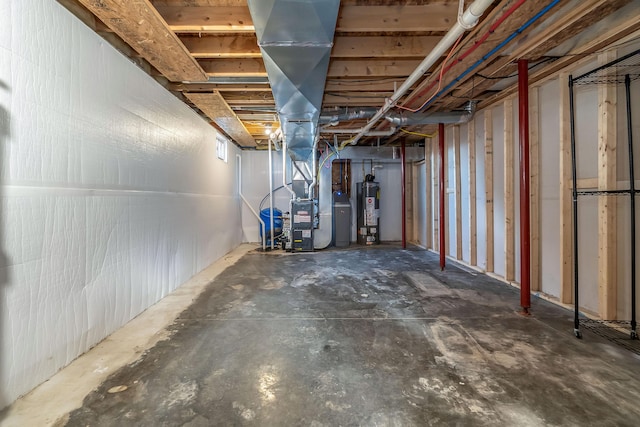 unfinished basement featuring gas water heater