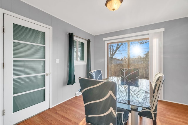 dining area with light wood-style floors