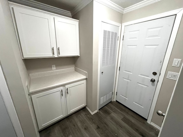 interior space featuring dark wood-style flooring and ornamental molding