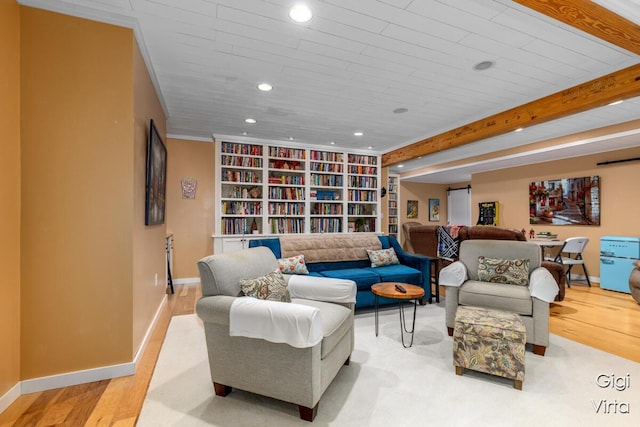 living room featuring beam ceiling, recessed lighting, wood finished floors, and baseboards