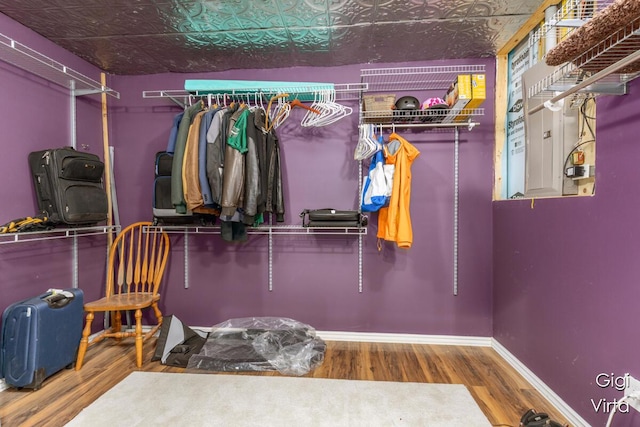 spacious closet with wood finished floors