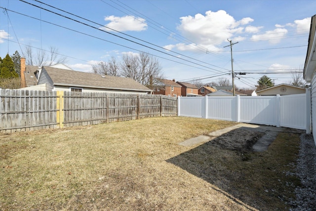 view of yard featuring a fenced backyard