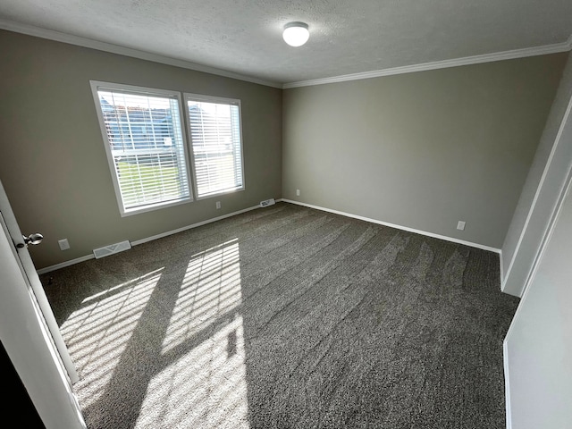 unfurnished bedroom with carpet, baseboards, and a textured ceiling