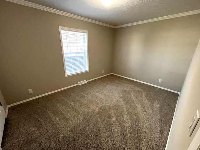 unfurnished room with crown molding, baseboards, visible vents, and dark colored carpet