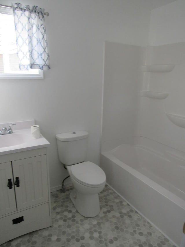 bathroom with toilet and vanity