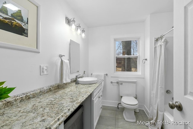 full bathroom with tile patterned floors, curtained shower, toilet, and vanity