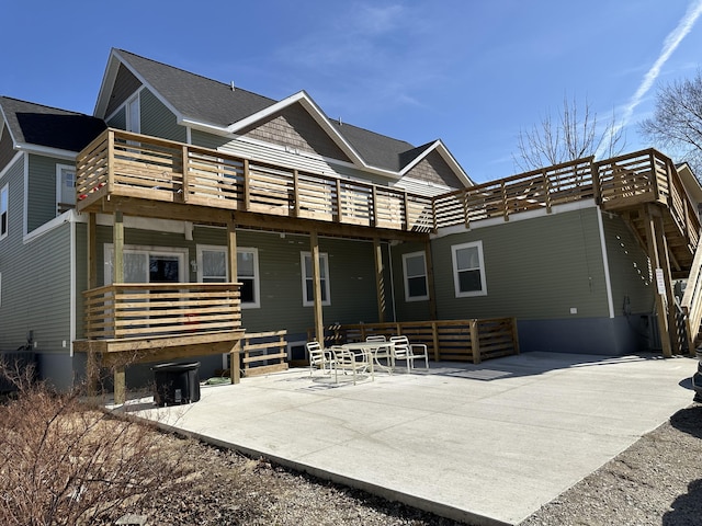 rear view of house featuring a patio area