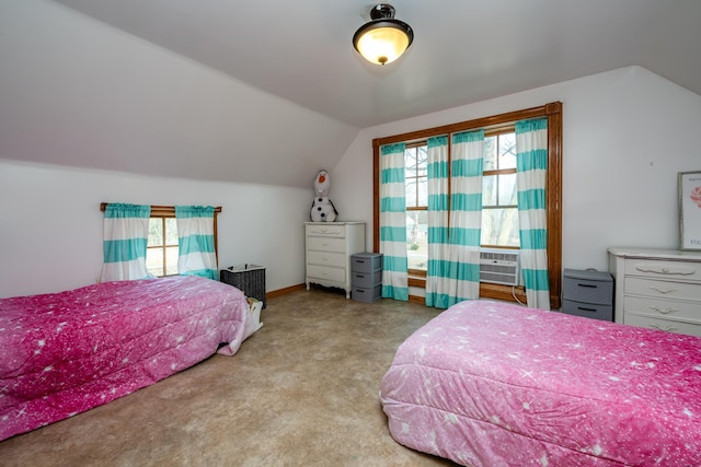 bedroom featuring multiple windows, cooling unit, lofted ceiling, and carpet floors