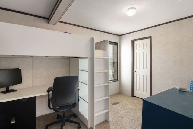 office space with crown molding, light colored carpet, and visible vents