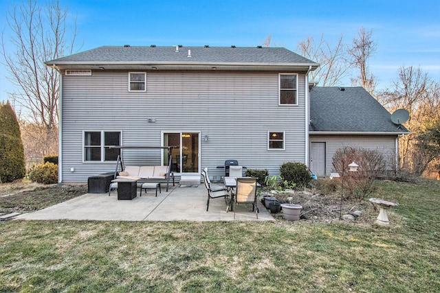 rear view of property with a patio area, an outdoor living space, a lawn, and a shingled roof