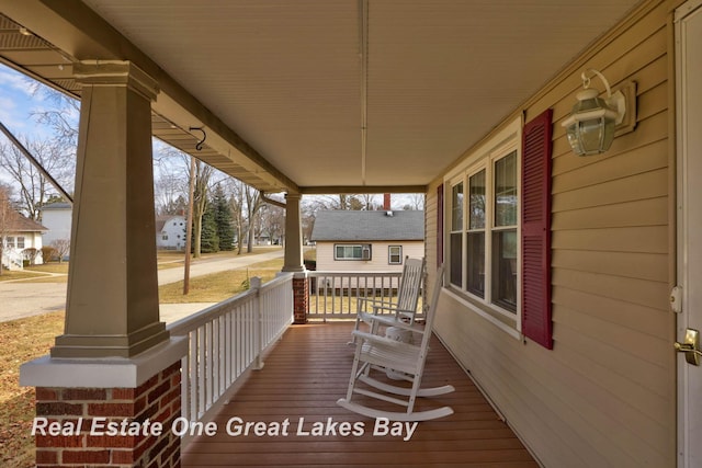 wooden deck with a porch