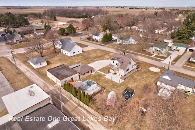 birds eye view of property with a residential view