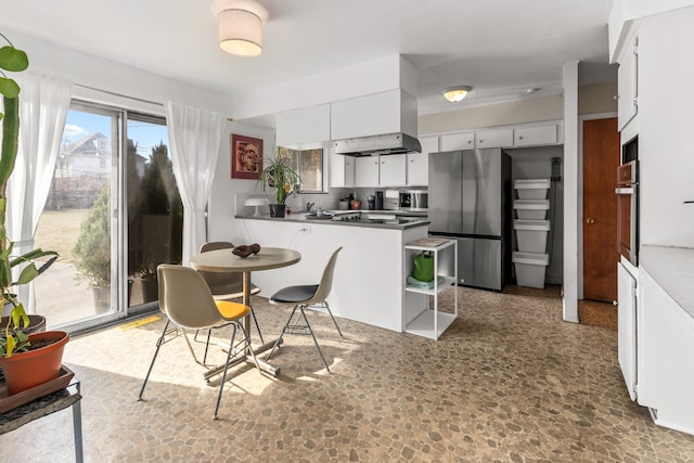 dining room with stone finish flooring