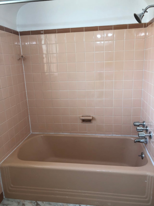 full bath with shower / washtub combination