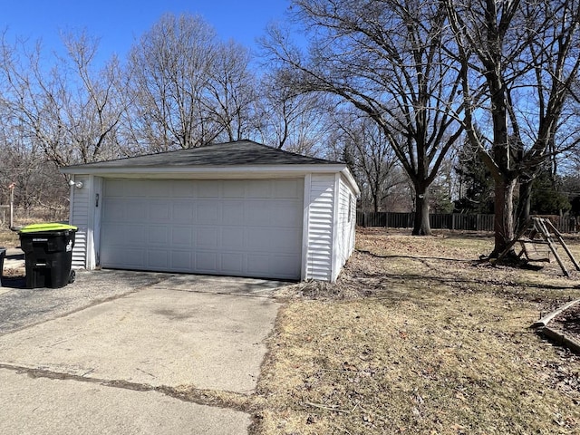 detached garage with fence