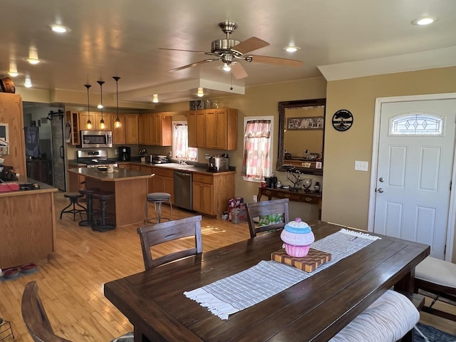 dining area with recessed lighting, a ceiling fan, and light wood-type flooring