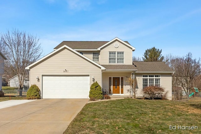 traditional-style home featuring a shingled roof, a front lawn, fence, concrete driveway, and an attached garage