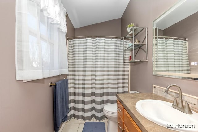 full bath featuring toilet, lofted ceiling, a shower with curtain, tile patterned floors, and vanity