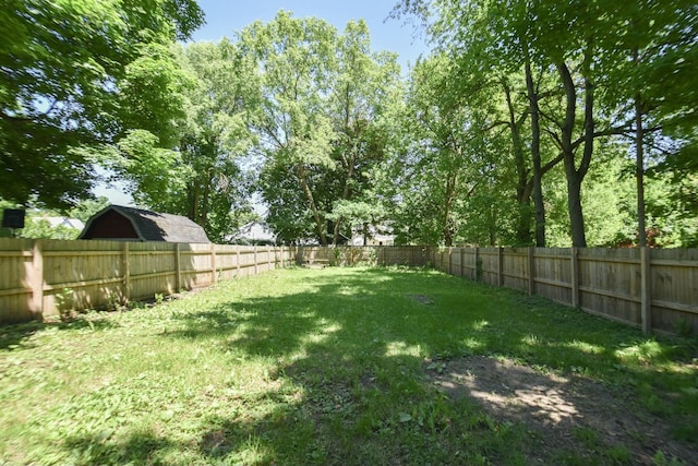 view of yard with a fenced backyard