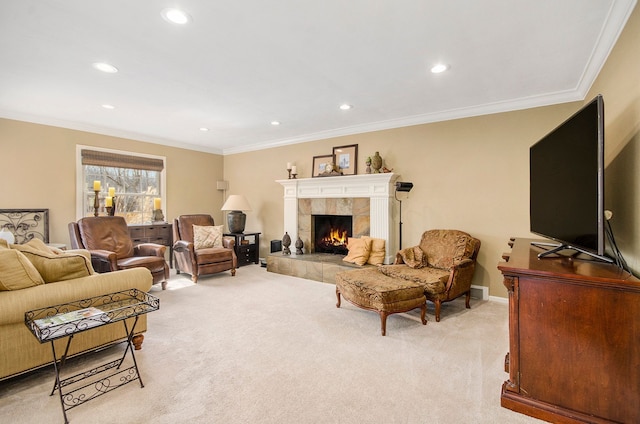 living area with baseboards, light colored carpet, ornamental molding, recessed lighting, and a fireplace