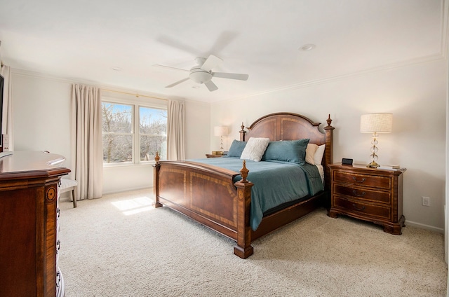 bedroom featuring baseboards, light colored carpet, ornamental molding, and a ceiling fan